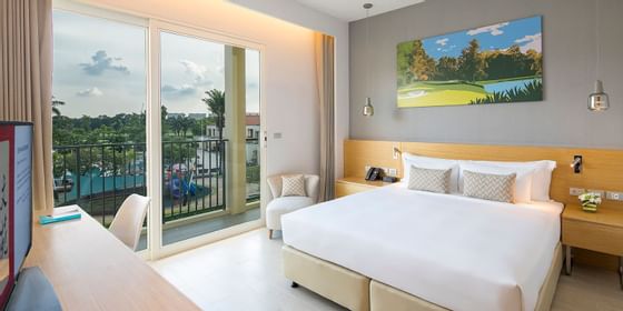 Bedroom arrangement with a king size bed at Eastin hotel