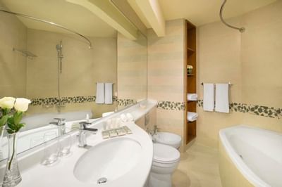 Bathtub in the bathroom of Seasons Suite at City Seasons Towers