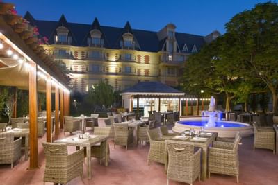 view of patio cafe by night at Al Aziziyah Boutique Hotel