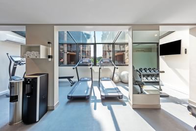 Fully equipped fitness center at Amora Hotel Melbourne