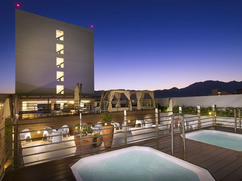 Dual hot tubs on the terrace at Fiesta Inn Puerto Vallarta Isla