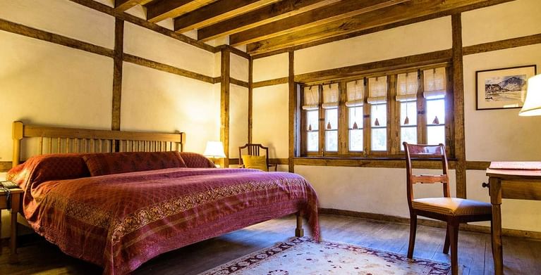 Interior of the Standard room bedroom at Serena Khaplu Palace