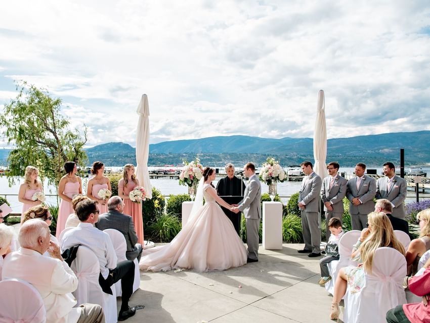 A wedding ceremony at the Patio in Manteo Resort Waterfront