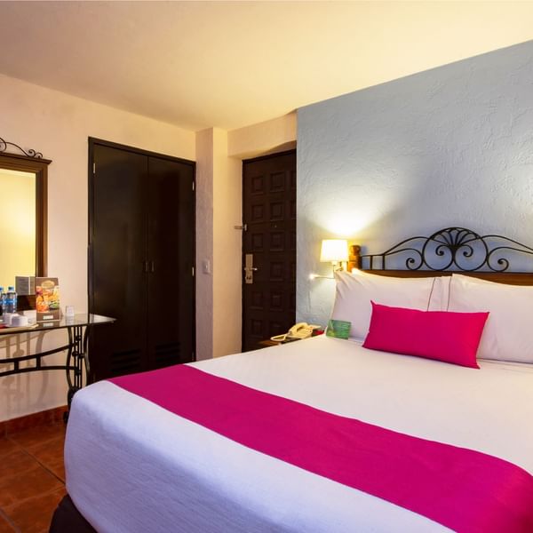 King bed in Studio Room at Gamma Hotels