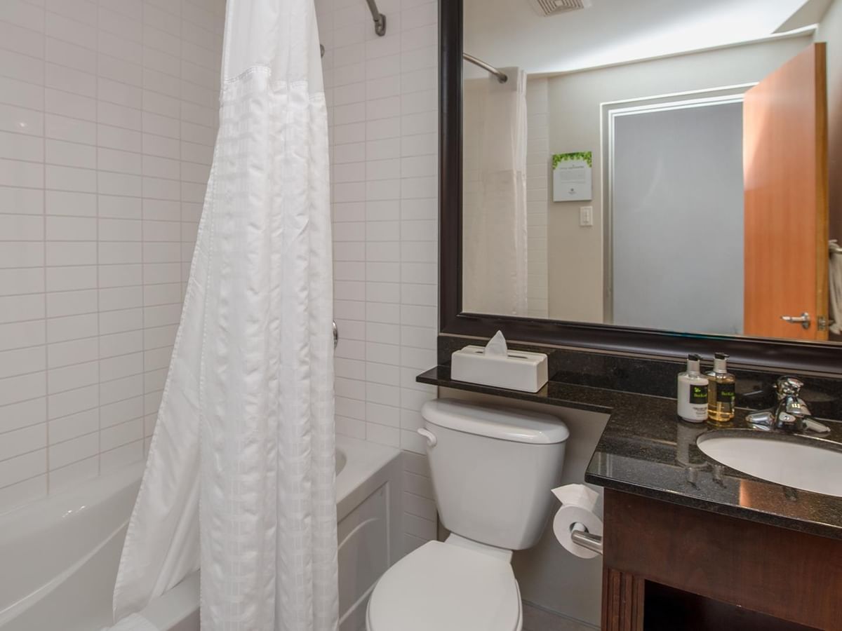 Bathroom with tub and toilet.