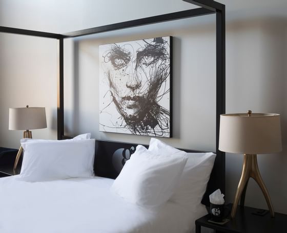 bed with intense artwork