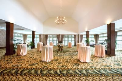 High tables in Bougainvillea Hall at Pelangi Beach Resort & Spa