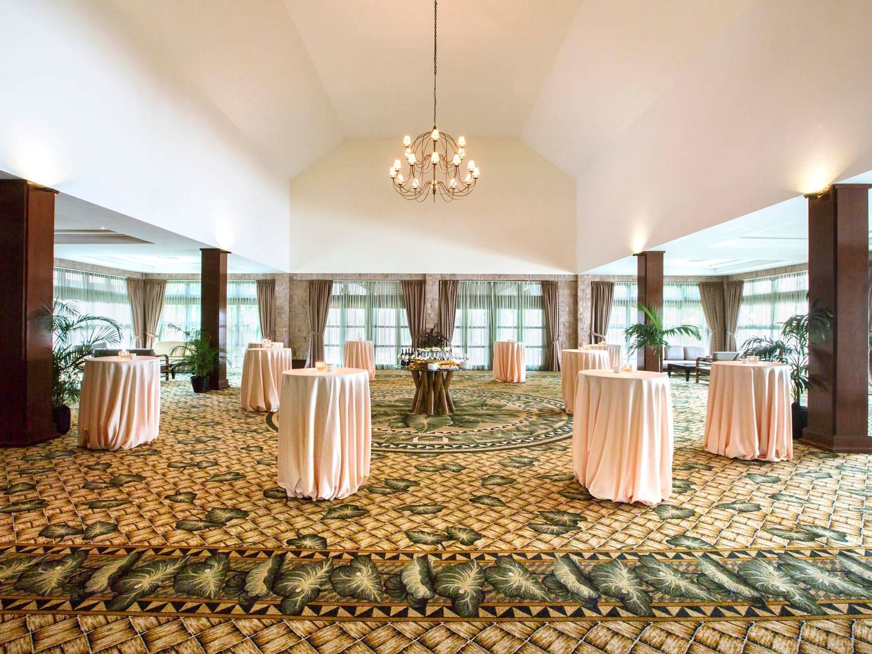 High tables in Bougainvillea Hall at Pelangi Beach Resort & Spa