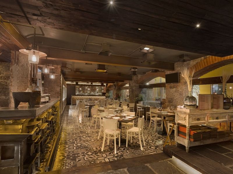 Dining set-up in El Anafre Rojo restaurant at Gamma Hotels