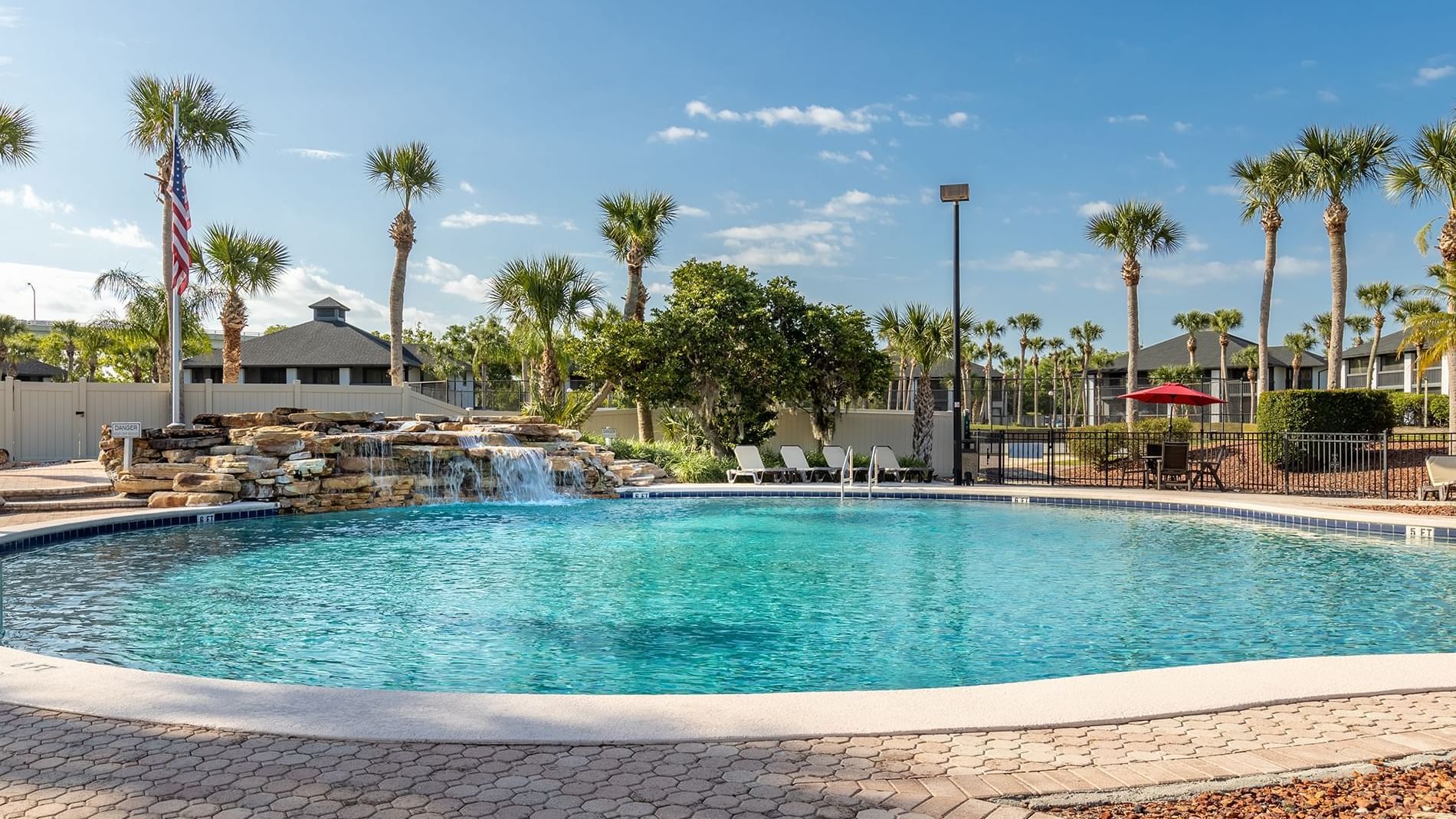  Exterior view of palm coast pool area at Legacy Vacation 