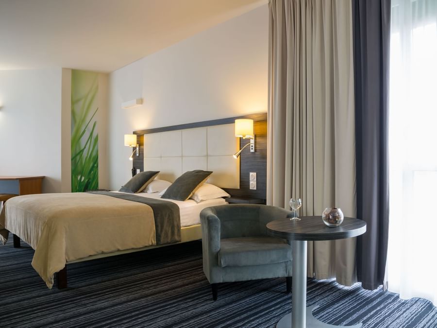Spacious bedroom in Superior Double Room at Hotel La Verriaire