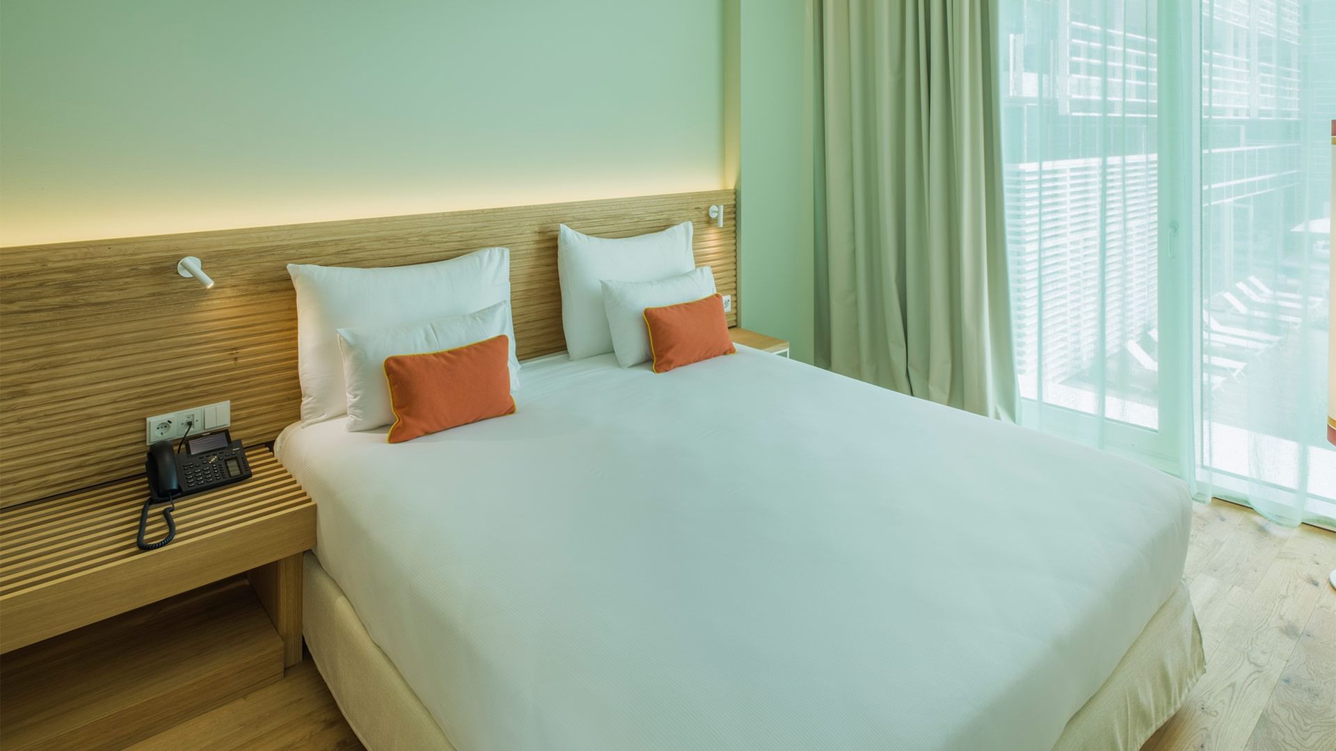 Large bed in Apartment Sandolino at Falkensteiner Hotels