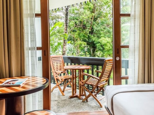 Balcony dining area in Ocean View Room at Warwick Fiji