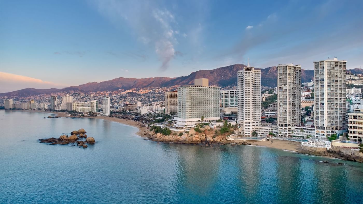 Distant view of the hotel and sea at Fiesta Americana Brand