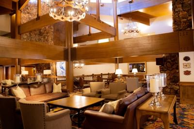Interior of lobby area with lounges at Stein Eriksen Lodge