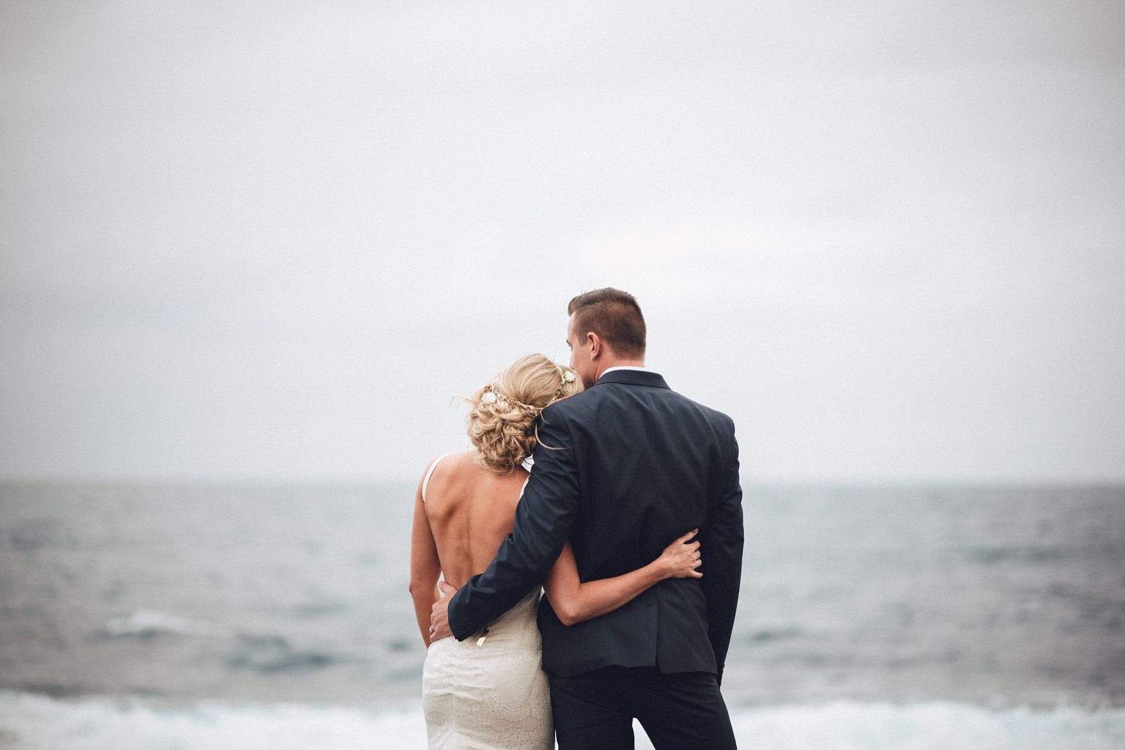 A wedding couple on the beach at Mercure Gerringong Resort