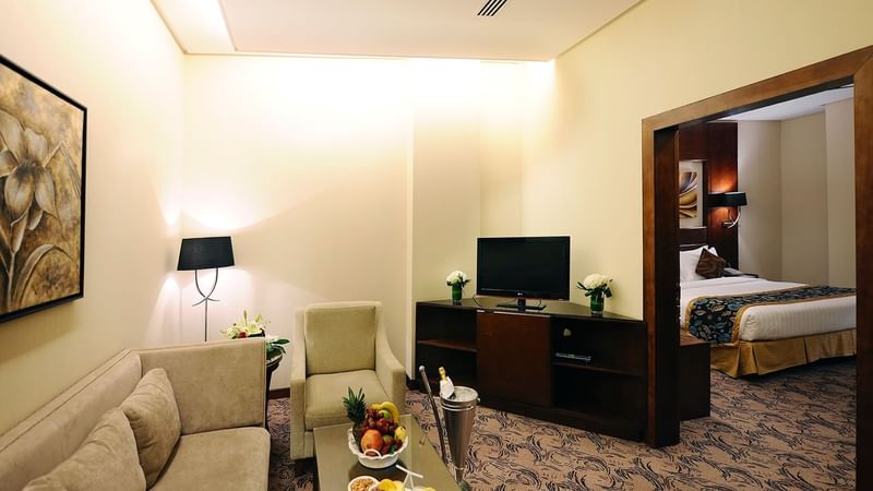 TV lounge area in Junior Suite at Al Hamra Palace by Warwick Riyadhd