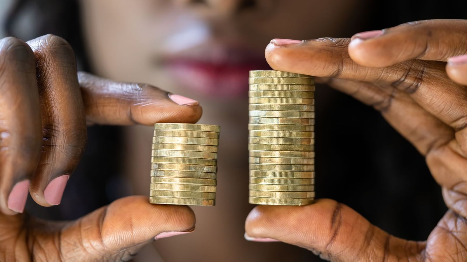 Close-up of lady holding coins at Legacy Vacation Resorts