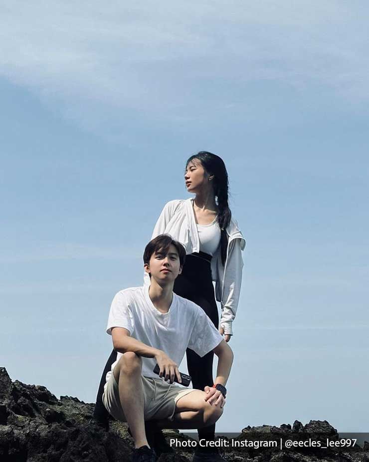 young couple posing in Cape Rachado Lighthouse