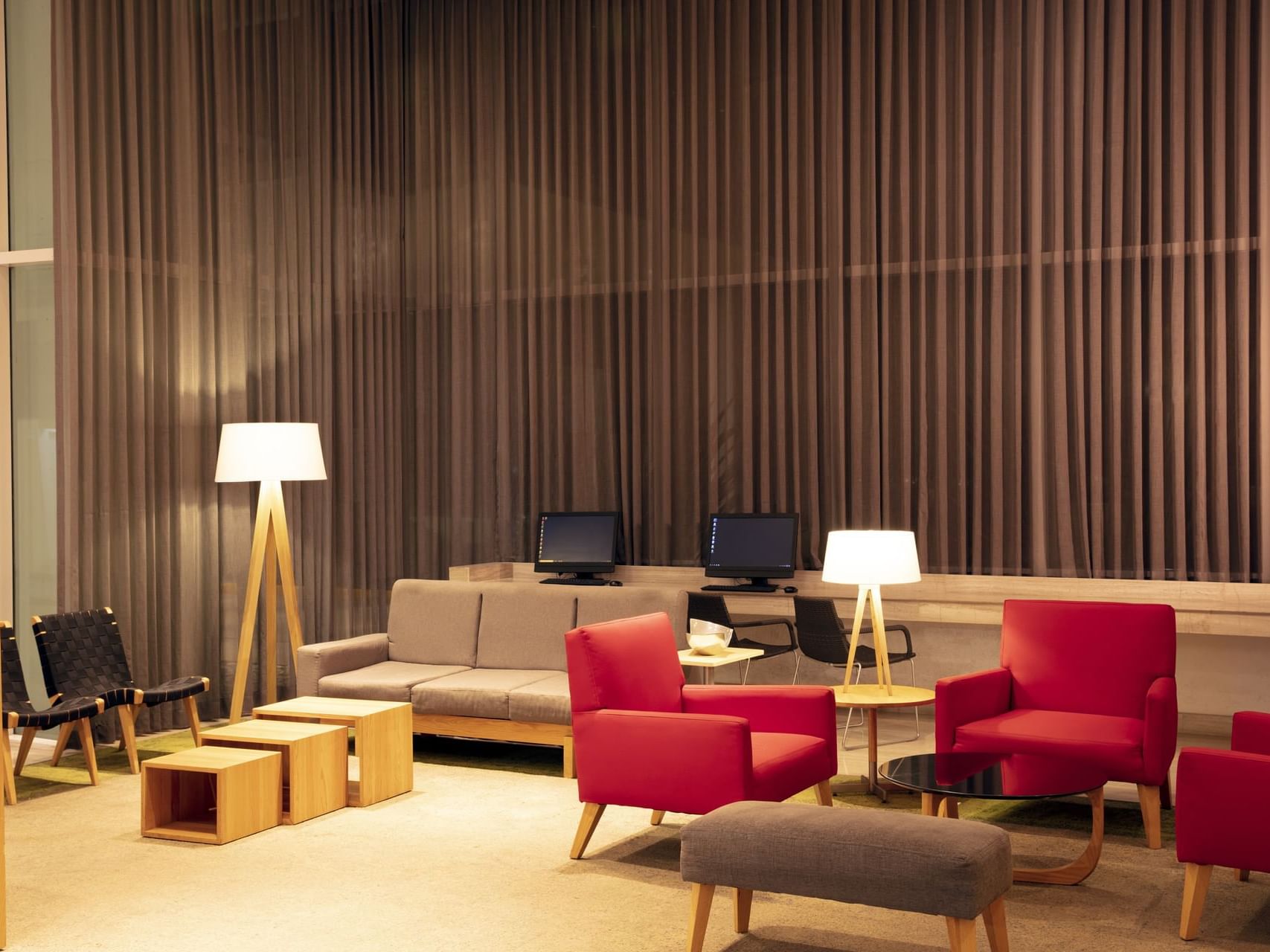 Lounge area with sofas in a Business center at Fiesta Inn