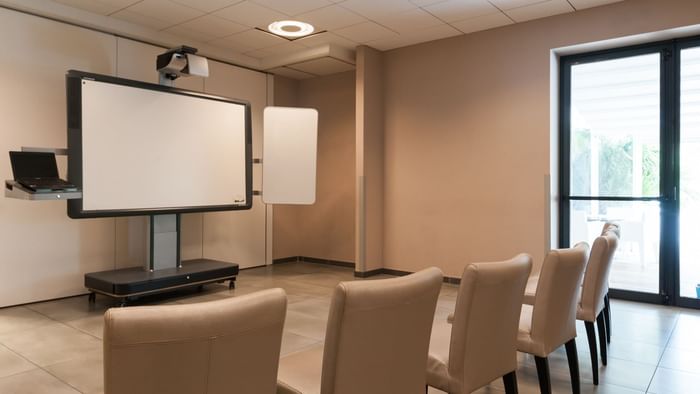 Board room arrangement with projector at Hotel La Grange