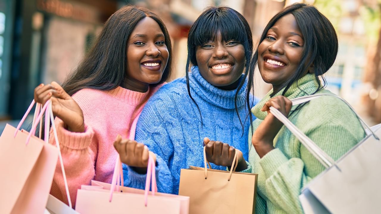 three women shopping together