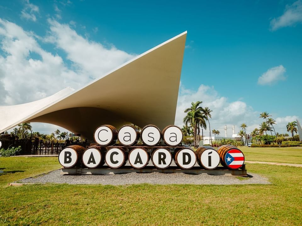 Large sign by the entrance of The Bacardi Rum Distillery near Las Casitas Village