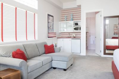 Living area interior of Queen Premiere La Rouge at Retro Suites