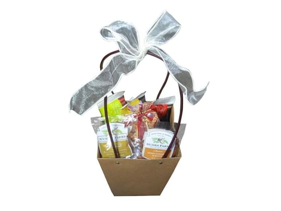A small basket containing an assortment of snacks.
