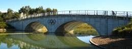A bridge with Olympic rings at the Sydney International Regatta Centre.