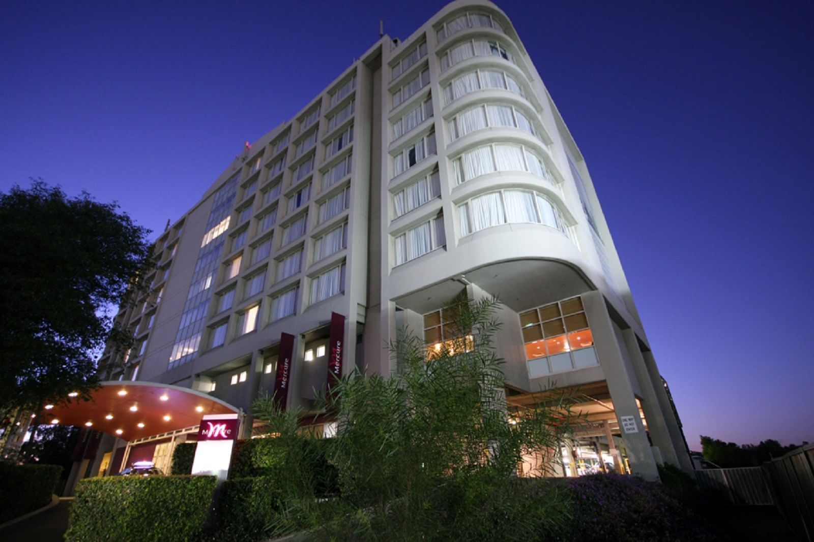 Exterior view of Mercure Sydney Parramatta at sunset