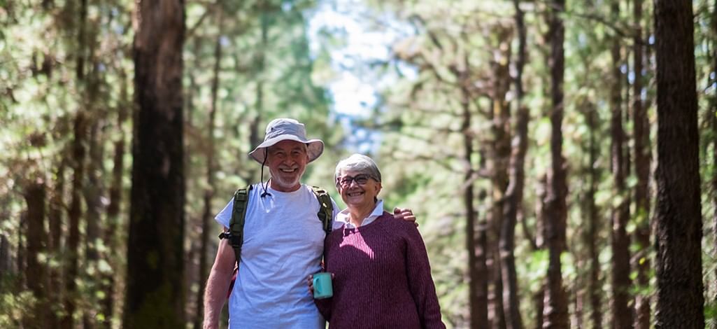 An old couple in a forest