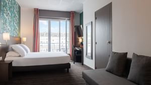 Double Bed in a Sofa Premium Triple Room at Hôtel de l'Europe