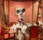 A Waiter in Mandhari Restaurant at Nairobi Serena Hotel
