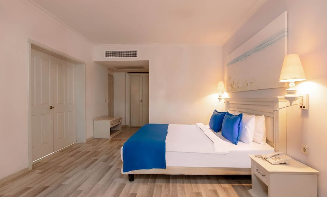 Two lamps beside the bed in Suite at Bodrum Imperial 