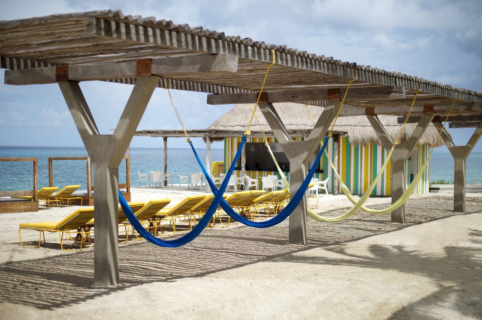 Hammocks & lounges overlooking the sea at IOH Freestyle Hotels