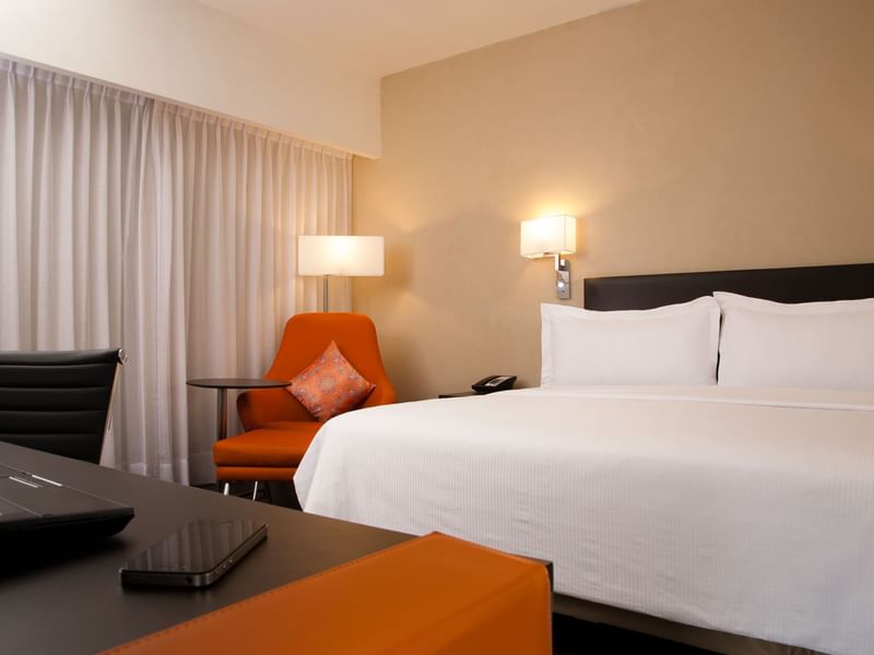 Close up on the king bed in the Loft room at Fiesta Inn