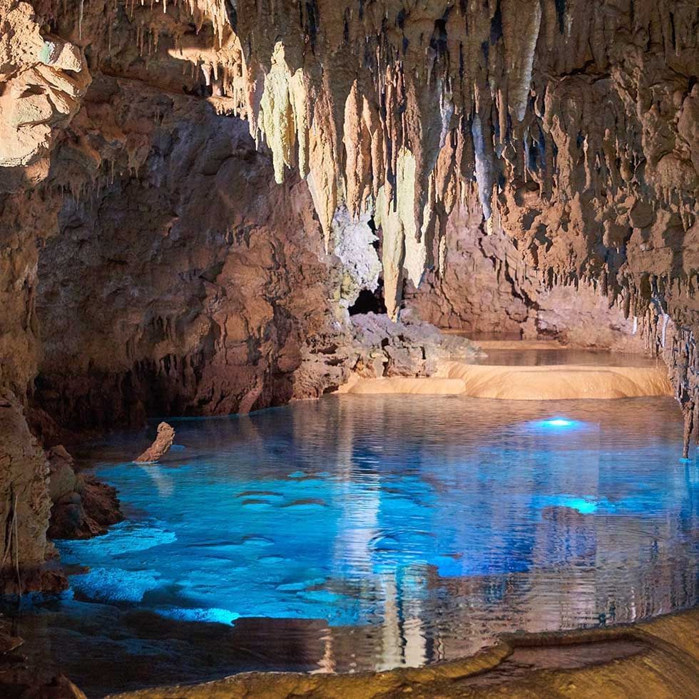 Stalactite Cave with crystal clear pond, Falkensteiner Hotels