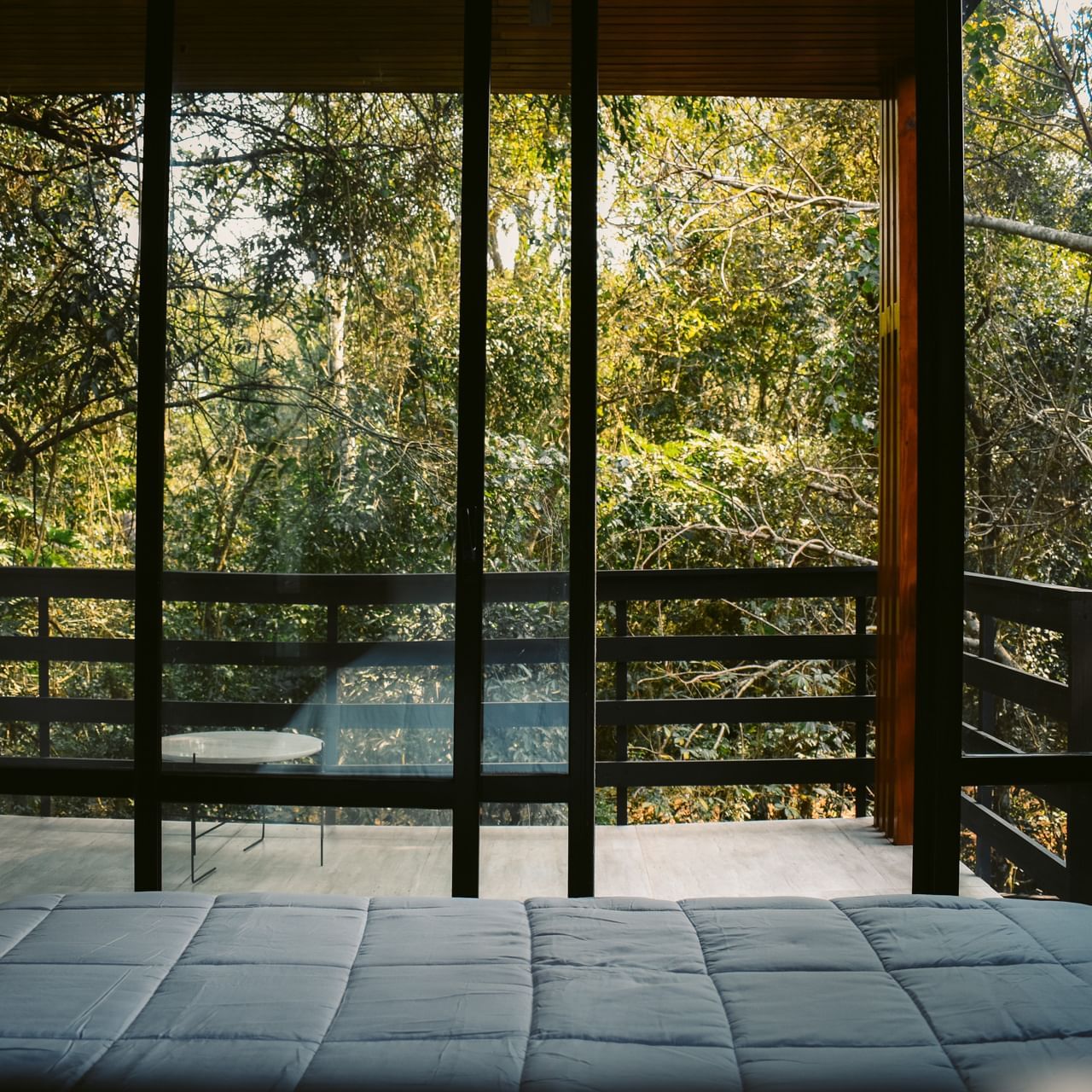 Balcony & bedroom area in a room at La Cantera Lodge de Selva
