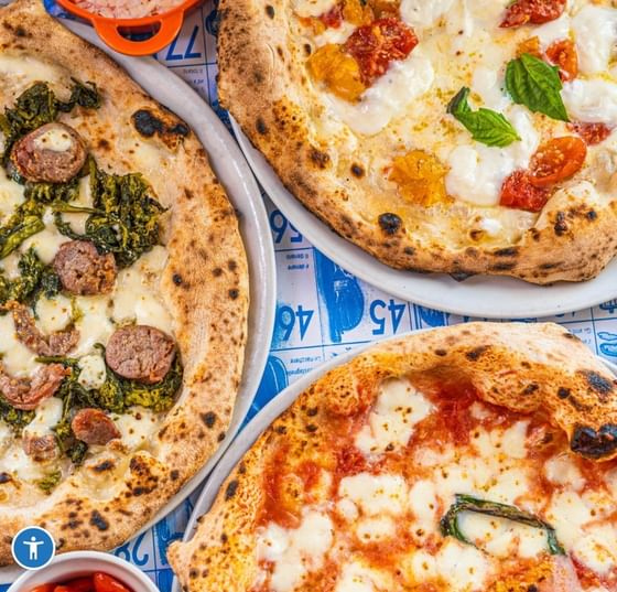  Pizza trio on branded plate from O Munanciello-MiMo-District