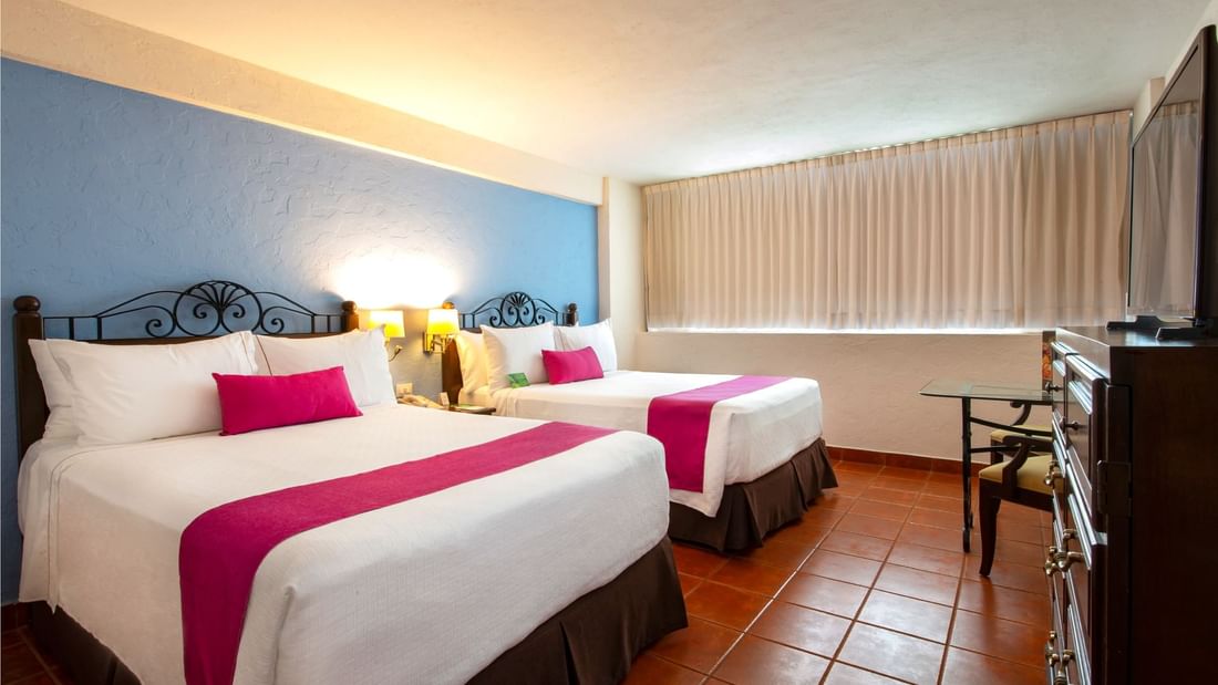 Twin beds in Superior Double Room at Gamma Hotels