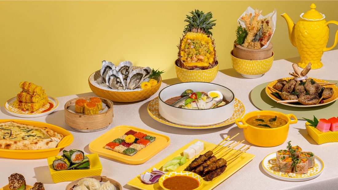 Various dishes served on a table in the Pan-Asian Buffet at Sunway Resort