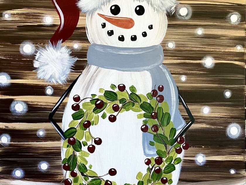 snowman painting holding a green wreath 