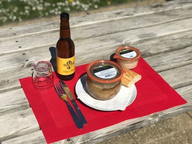 A beer with bread & jar dishes served at The Originals Hotels