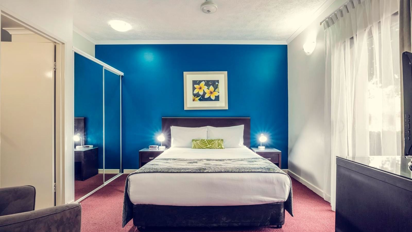 King bed in Resort Spa Suite at Darwin Airport Hotels