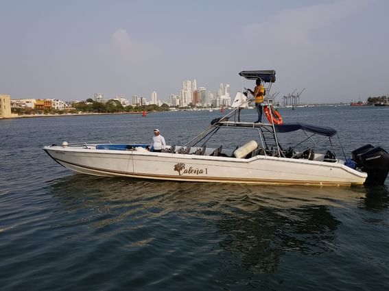 Caleña commercial boat on the sea near Hotel Isla Del Encanto