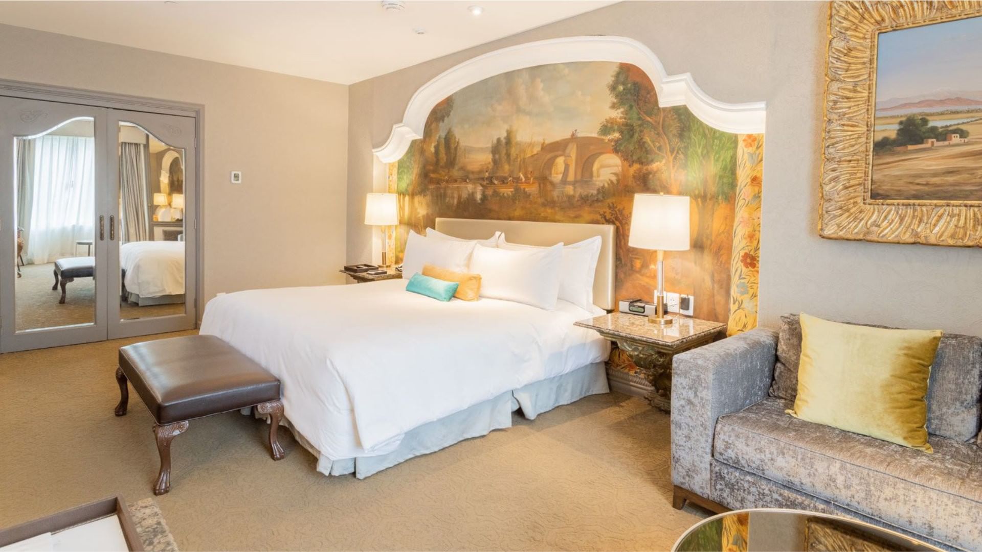 King Executive Tower featuring a scenic wall mural and elegant classical furniture at Quinta Real Monterrey