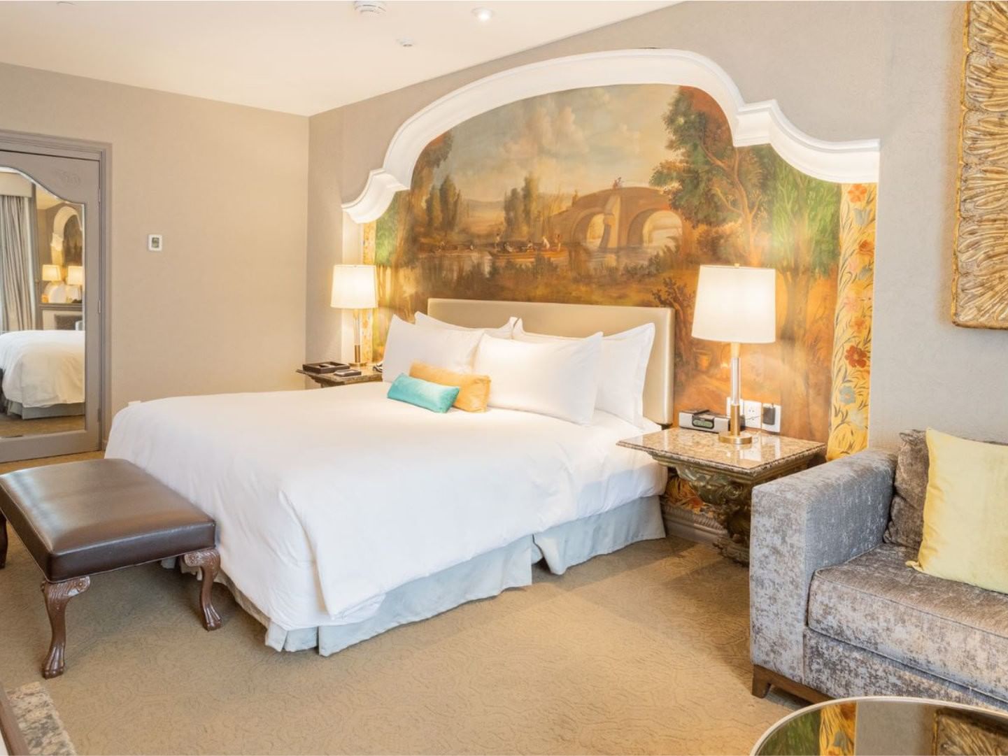 King Executive Tower featuring a stunning landscape mural headboard and classic furniture at Quinta Real Monterrey