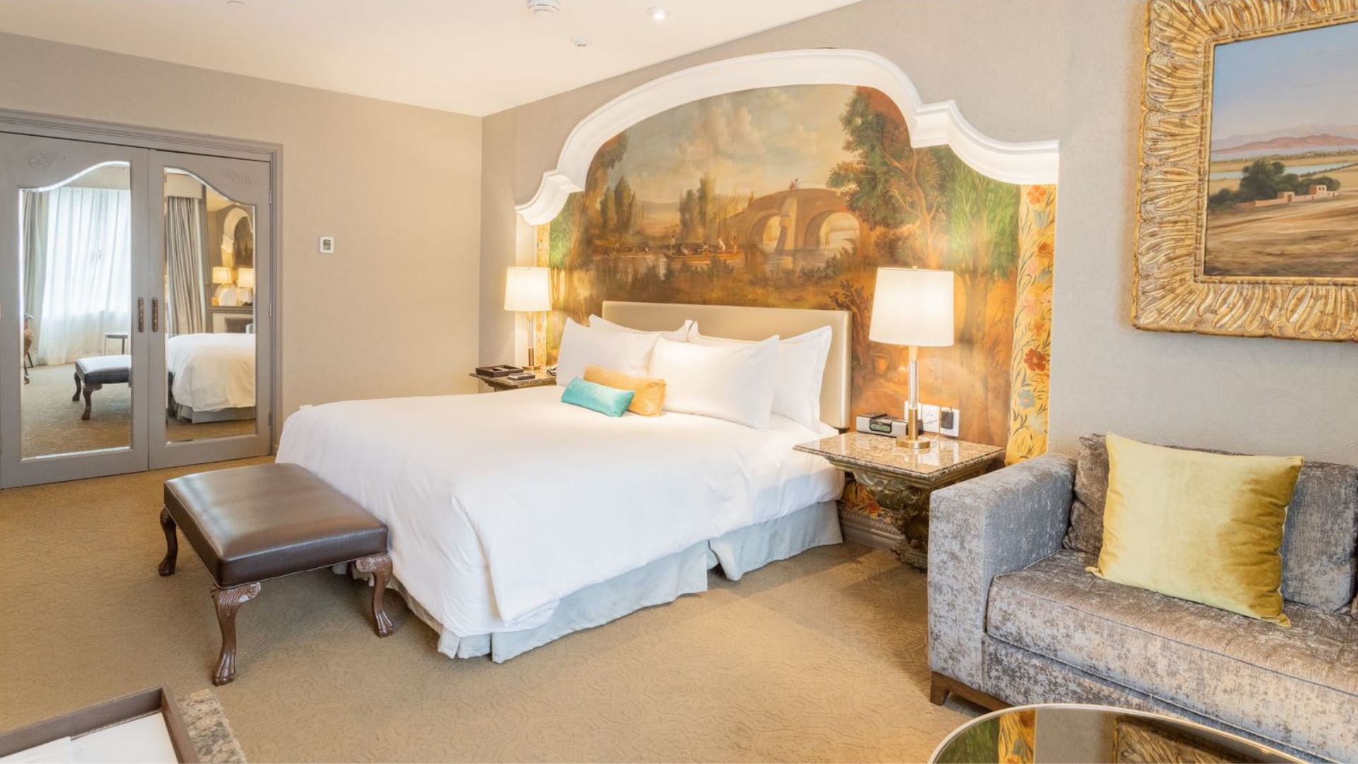 King Executive Tower featuring a stunning landscape mural headboard and classic furniture at Quinta Real Monterrey