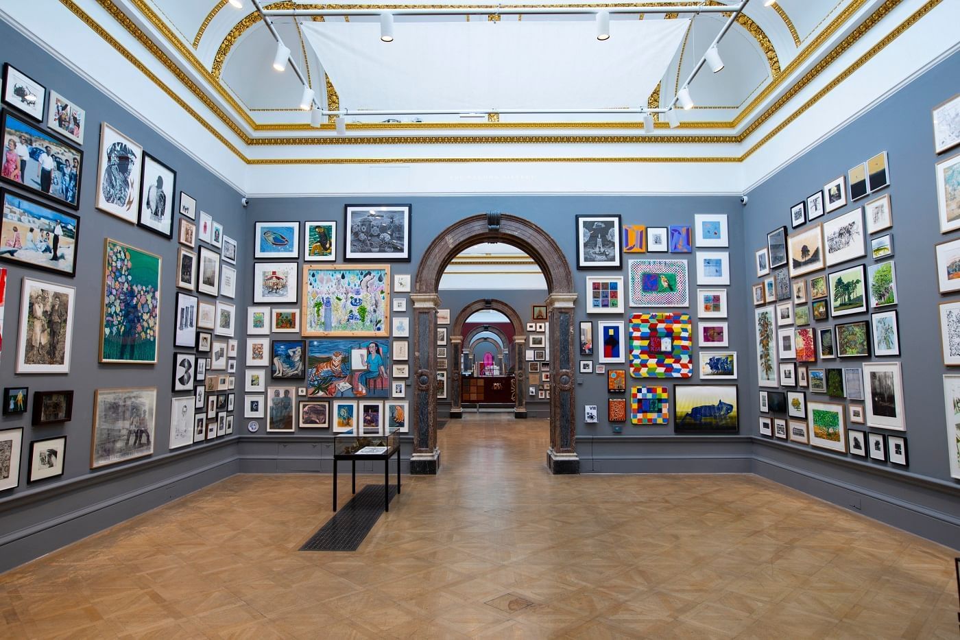 Royal Academy with numerous framed pictures near The Londoner